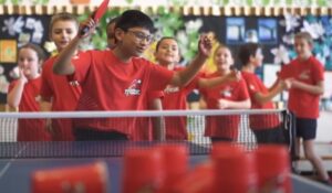 children playing table tennis